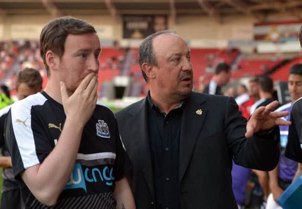 Rafa Benitez, with coach Ian Cathro, at the Keepmoat Stadium on Wednesday