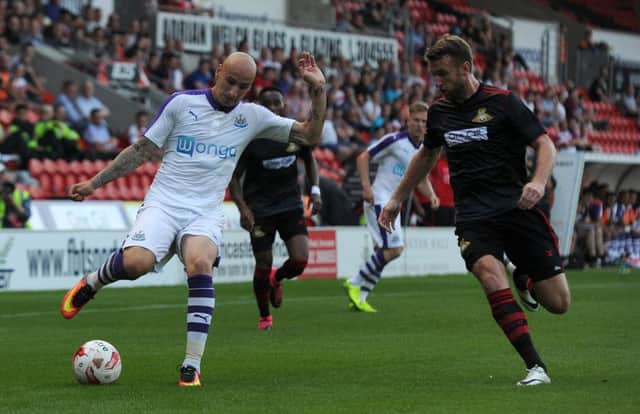Jonjo Shelvey in action for Newcastle against Doncaster in midweek