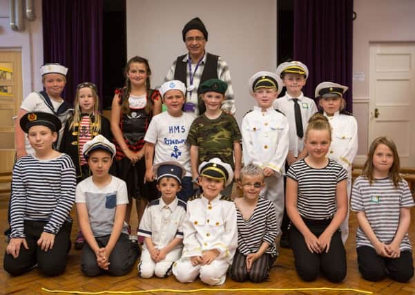 Ridgeway Primary Academy pupils, and teacher Mick Hassen, dress up in style to mark Seafarers Awareness Week.