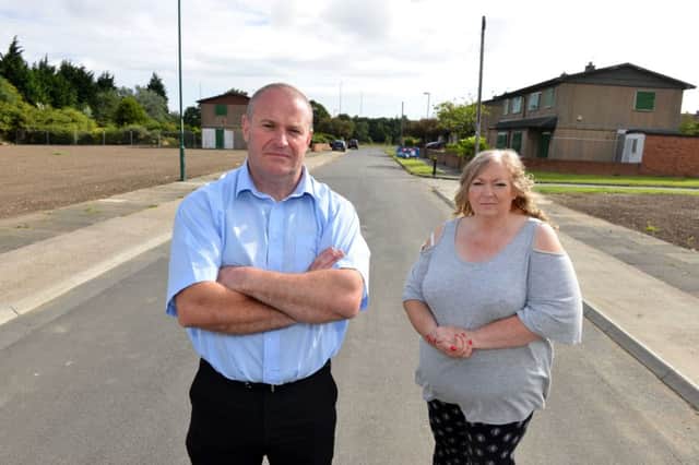 Remaining Lakes Estate residents are angry over mess being left after demomolition. 
Dave Kennedy and Pauline Smith.