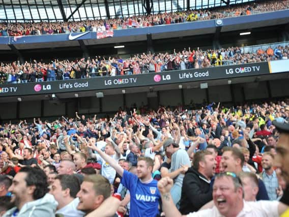 Sunderland fans celebrating Defoe's goal at the Etihad.