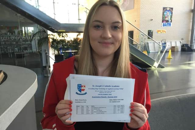 St Joseph's Catholic Academy Sixth Form pupils collect their A-level results. Emma Purvis.