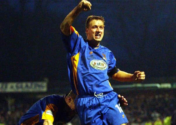 Nigel Jemson enjoys hitting the winner when Shrewsbury Town beat David Moyes' Everton in the FA Cup in 2003