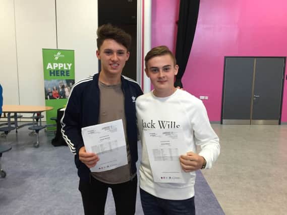 Jarrow School pupils Joseph Barclay, left, and Blane Stamps with their GCSE results.
