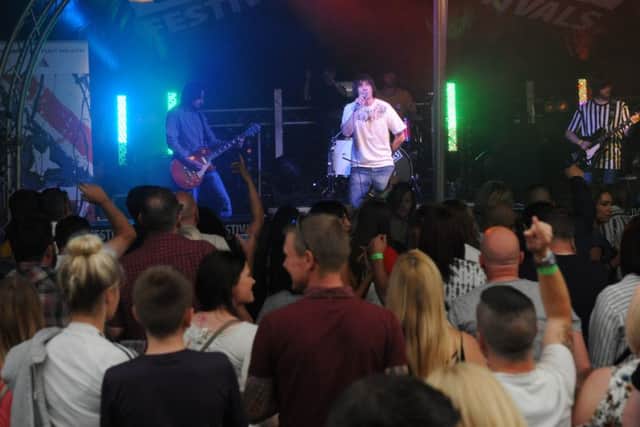 The Total Stone Roses on stage at Fake Festival at the Bent Park, South Shields.