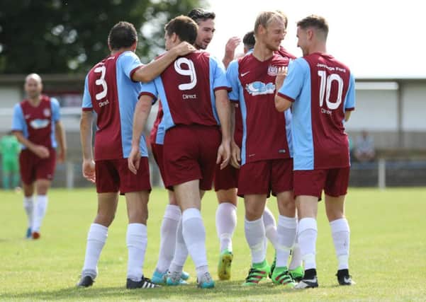 South Shields' players celebrate their first goal at Chester-le-Street Town. Image by Peter Talbot.