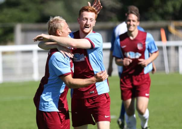 David Carson celebrates the opening goal with brother Danny. Picture by Peter Talbot