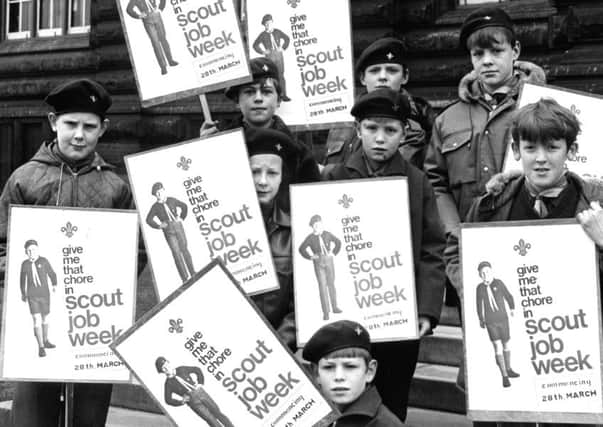 South Shields Scouts with their placards before setting off from the Town Hall to march through the streets of the town advertising their annual Bob a Job Week is to be held during the Easter holidays.