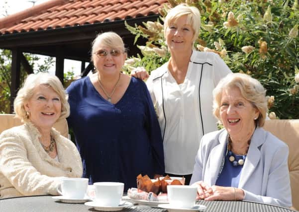 Cancer Connections new patron Dame Margaret Barbour talks to chairman Fay Cunningham and founder Deborah Roberts, with Dame Margaret's sister Audrey Harvey.