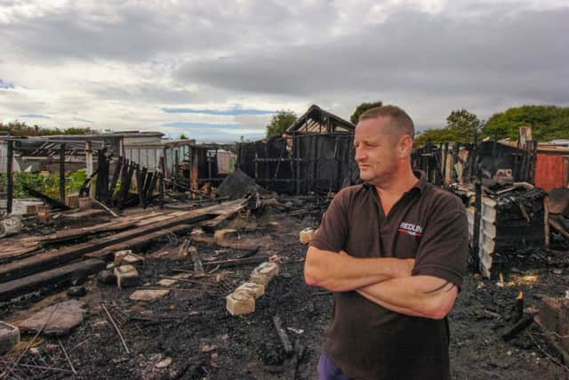 Mark Thomas surveys the wreckage of his allotment after a fire in early hours of this mornng at Holder House Allotments, Holder House Way, South Shields