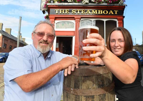 The Steamboat has won regional CAMRA
 landlord Joe Mooney and bar manager Kathleen Brain