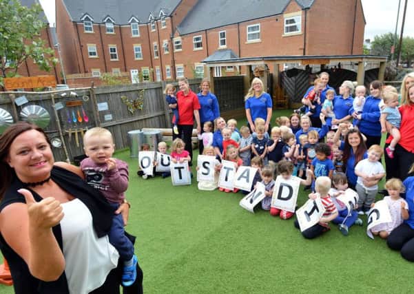 Outstanding Ofsted at Abacus Day Nursery. Manager Margaret Campbell with Matthew Walsh aged two.