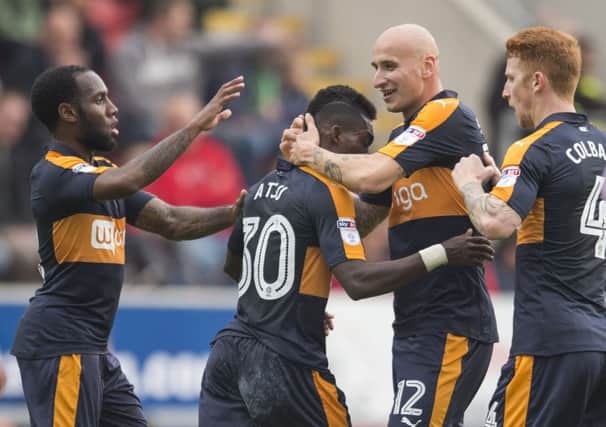 Christian Atsu and the Newcastle players celebrate at Rotherham