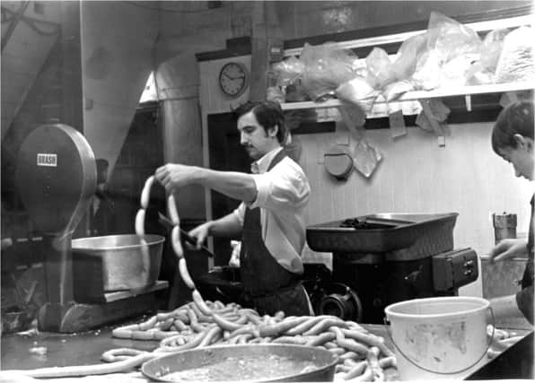 Michael Dickson making sausages at the Prince Edward Road shop in the 1970s.
