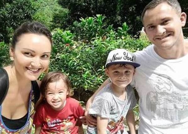Luke Wilkinson and wife Di with children Jude and Finn.