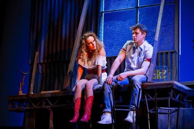 Hannah Price as Ariel Moore and Luke Baker as Ren in Footloose.