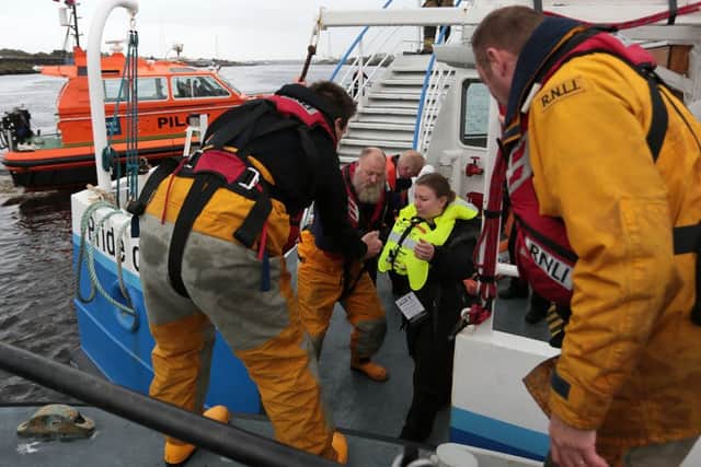 'Casualties' are evacuated from the ferry onto the RNLI lifeboat. Please Credit:  Adrian Don/RNLI