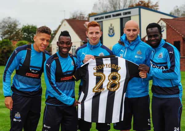 Newcastle United players, from left, Dwight Gayle, Christian Atsu, Jack Colback, Jonjo Shelvey and Cheick Tiote promoting the Stoptober campaign.