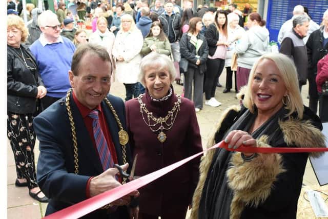 The Mayor and Mayoress of South Tyneside, Councillor Alan and Councillor Moira Smith, cutting the ribbon to officially open Jarrows community Fayre with Carol Jakeman-Flounders