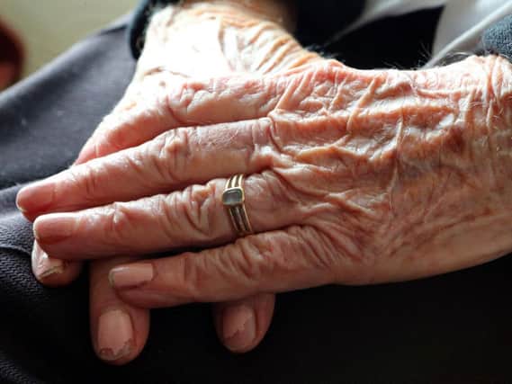 Most councils are failing to pay enough towards the cost of caring for older people in their homes, a report says. Pic: PA.