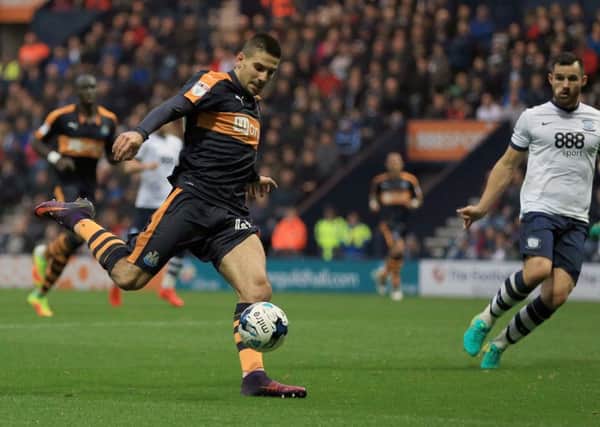 Newcastle United's Aleksander Mitrovic scores his sides first goal against Preston.