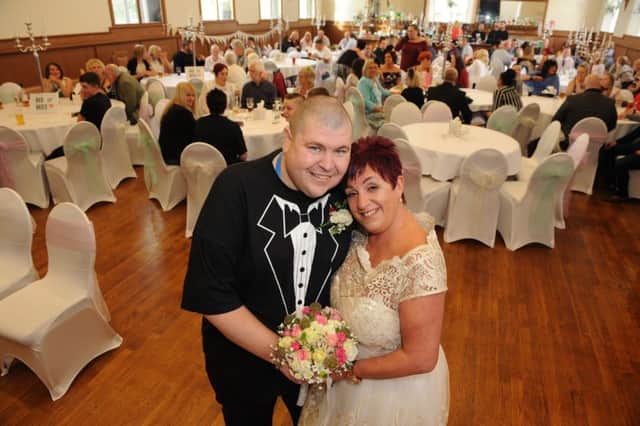 Christopher and Lisa Perry renew their wedding vows in front of family and friends at Jarrow Civic Hall.