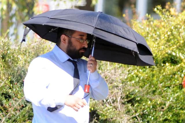 Taxi driver Amir Azad leaving South Tyneside Magistrates Court