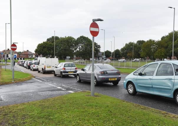 Congestion on the John Reid Road roundabout.