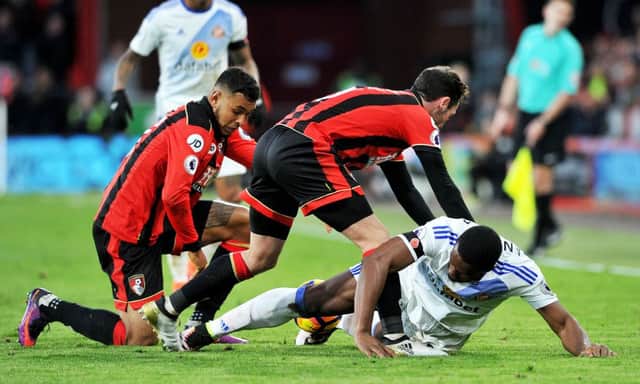 Victor Anichebe battles for the ball on the ground at Bournemouth. Picture by Frank Reid