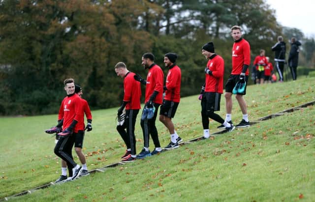 Paul Dummett, far right, in training with Wales yesterday