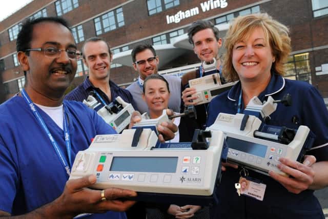 Dr Sanjay Deshpande, far left, ahead of one of his previous life-saving trips to India.