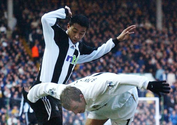 Newcastle's Nolberto Solano, pictured left tangling with Leeds's Lee Bowyer, had the final word in a seven-goal thriller.