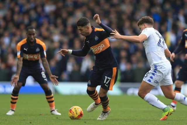 Leeds United's Kalvin Phillips (right) and Newcastle United's Ayoze Perez battle for the ball