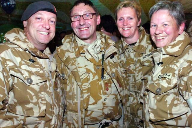 BACK FROM AFGHANISTAN, GARY MELTBY, MIKE MASSAM, SHARON MCDOWELL, AND JANICE DAVIES.