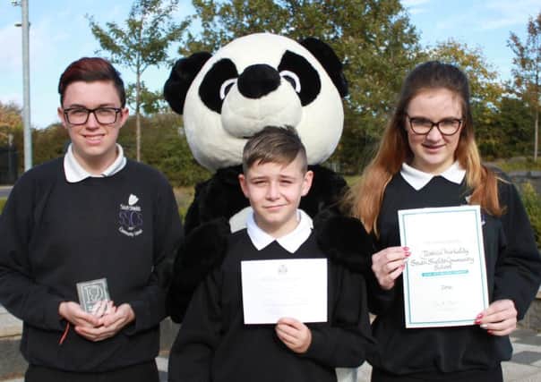 South Shields School students, L-R, Max Roberts, Peter Millet and Jessica Kirkaldy.