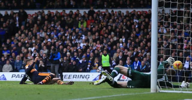 Dwight Gayle scores his second goal against Leeds