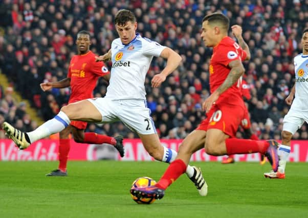 Billy Jones in action at Anfield