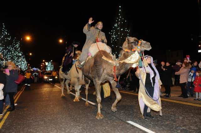 Christmas Camel Parade is led by high impact drumming group Spark! and stilt walkers as they process along Ocean Road to Haven Point.