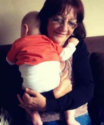 Maggie Trainor with grandson Jacob. Maggie died suddenly aged just 63 as a result of rare illness encephalitis.