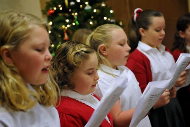 Marsden Primary School choir entertain with a selection of Christmas songs.