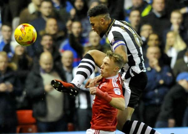 Jamaal Lascelles battles for Newcastle United in the Championship defeat at Nottingham Forest. Picture by Frank Reid