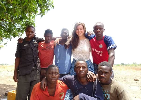 Elizabeth with locals in Zambia
