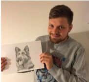 Asa Hooper with his prize, a print from JR Portraits.