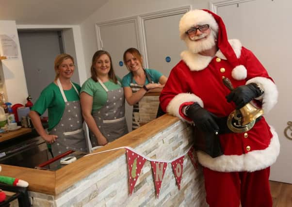 Santa visits the new Cappuccino Kids cafe in South Shields. With him are Laura Ambler, Charlie Harding and Leanne Silmon.