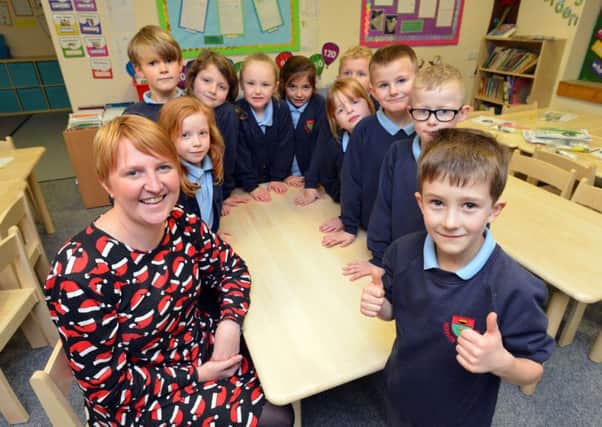 St Oswald's CE Primary School Key Stage 2 Sats.
Headteacher Helen Smith and pupil Charlie Hurst, six