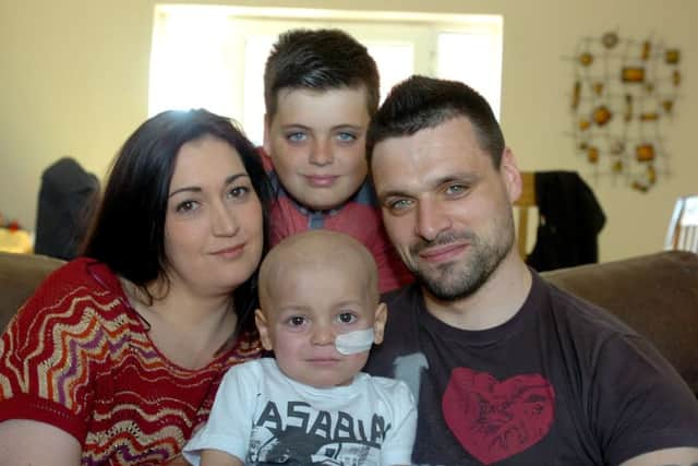 Bradley Lowery with mum Gemma, dad Carl and brother Kieran.