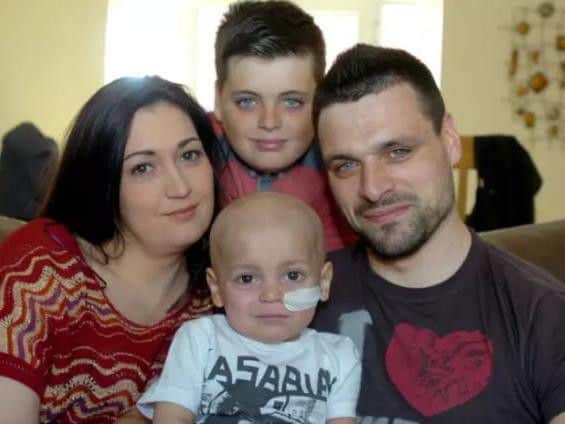 Bradley Lowery with mum Gemma, dad Carl and brother Kieran.