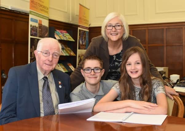Councillors Alan Kerr and Joan Atkinson with Rio Porter from the Young Peoples Parliament and Jessica Maguire from the Friends Against Bullies Junior group.