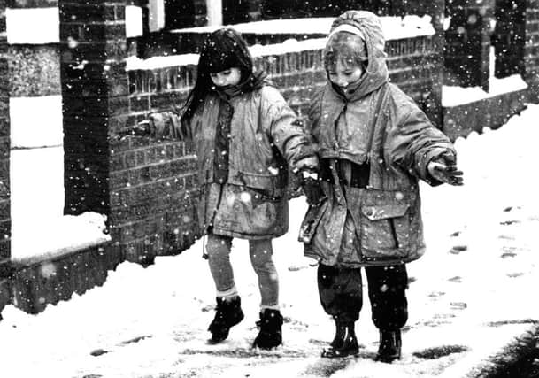 Back in 1994, two youngsters were pictured taking it easy down Erskine Road.