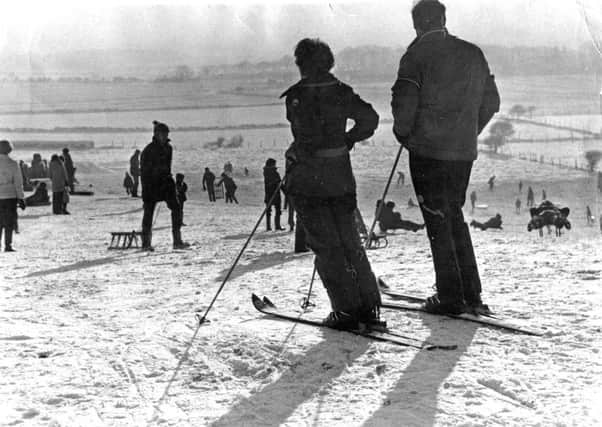 Skiers and tobogganists on Cleadon Hill.